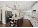 Spacious kitchen featuring stainless steel appliances, a large island, and modern lighting at 123 Turnstone Dr, Durham, NC 27703