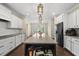 Spacious kitchen with a large island, stainless steel appliances, and an open layout at 123 Turnstone Dr, Durham, NC 27703