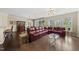 Bright living room with hardwood floors, modern lighting, open concept and views of the outdoor space at 123 Turnstone Dr, Durham, NC 27703