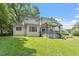 Backyard featuring a deck with ample space for entertaining and a small play area at 124 Lord Ashley Rd, Raleigh, NC 27610