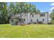 Large backyard with a spacious deck, perfect for outdoor gatherings and relaxation at 124 Lord Ashley Rd, Raleigh, NC 27610