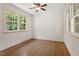 Bright bedroom with hardwood floors and large windows offering plenty of natural light at 124 Lord Ashley Rd, Raleigh, NC 27610