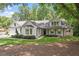 Charming single-story home with fresh, modern paint and a landscaped front yard at 124 Lord Ashley Rd, Raleigh, NC 27610