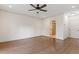 Large main bedroom with hardwood floors and a private ensuite bathroom at 124 Lord Ashley Rd, Raleigh, NC 27610