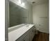 Bathroom with double sink, vanity, and chrome fixtures at 125 Fraiser Fir Way, Lillington, NC 27546