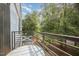 Enjoy this condo's relaxing balcony, perfect for enjoying the views of the lush trees and neighborhood at 1300 St Marys St # 408, Raleigh, NC 27605