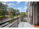 Enjoy this condo's relaxing balcony, perfect for enjoying the views of the lush trees and neighborhood at 1300 St Marys St # 408, Raleigh, NC 27605