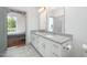 Spacious bathroom with double vanity, granite countertop and an attached bedroom at 1300 St Marys St # 408, Raleigh, NC 27605