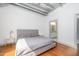 Bedroom with an en-suite bathroom featuring double vanities and tile flooring at 1300 St Marys St # 408, Raleigh, NC 27605