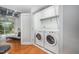 Convenient laundry closet with a side-by-side washer and dryer at 1300 St Marys St # 408, Raleigh, NC 27605