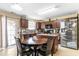 Well-equipped kitchen with an island, stainless steel appliances, and lots of cabinet space at 131 Botanical Ct, Bunnlevel, NC 28323
