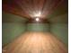 A room in the attic featuring wooden ceilings and floors at 141 S Broad E St, Angier, NC 27501