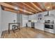 Updated kitchen with stainless steel appliances and a wood ceiling at 141 S Broad E St, Angier, NC 27501
