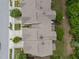 Aerial view of townhomes showcasing the roof and adjacent parking area at 1413 Glenwater Dr, Cary, NC 27519