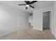 Spacious carpeted bedroom with neutral walls and a ceiling fan at 1413 Glenwater Dr, Cary, NC 27519