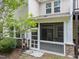 The screened porch with brick base provides an intimate outdoor living space at 1413 Glenwater Dr, Cary, NC 27519
