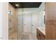 Modern bathroom showcasing a glass-enclosed shower and nice cabinets at 15 Magnolia Ln, Youngsville, NC 27596