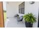 Cozy front porch with seating area and charming decorative elements at 15 Magnolia Ln, Youngsville, NC 27596