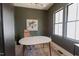 Bright and airy home office with large windows and neutral decor at 15 Magnolia Ln, Youngsville, NC 27596