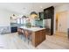 Stylish kitchen boasts a large island, modern appliances, and designer finishes at 15 Magnolia Ln, Youngsville, NC 27596