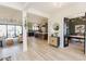 Bright open living space with kitchen and office space nearby, with modern decor and layout at 15 Magnolia Ln, Youngsville, NC 27596