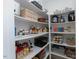 Organized pantry with adjustable shelving to meet all your storage needs at 15 Magnolia Ln, Youngsville, NC 27596