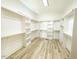 Spacious walk-in closet with ample shelving and storage at 15 Magnolia Ln, Youngsville, NC 27596