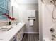Clean bathroom featuring a shower, white vanity, and fresh decor at 1612 Bethlehem Rd, Knightdale, NC 27545