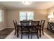 Formal dining room with natural lighting, and hardwood flooring, seats six people at 1612 Bethlehem Rd, Knightdale, NC 27545