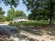 Well-maintained two-story home with a spacious lawn and a long driveway leading to the property at 1612 Bethlehem Rd, Knightdale, NC 27545