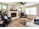Inviting living room with a brick fireplace, stylish decor, and comfortable seating at 1612 Bethlehem Rd, Knightdale, NC 27545