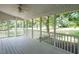 Relaxing screened porch offering views of the surrounding greenery and outdoor space at 1612 Bethlehem Rd, Knightdale, NC 27545