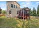 Exterior view of the back of the house, showing the deck with screening at 1612 Old Bramble Ln, Fuquay Varina, NC 27526