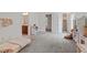 Spacious bedroom featuring a dollhouse, play kitchen, and bedroom access at 1612 Old Bramble Ln, Fuquay Varina, NC 27526