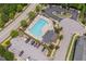 Aerial view of community pool, with plenty of lounge chairs and parking at 1612 Old Bramble Ln, Fuquay Varina, NC 27526