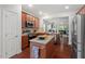 Modern kitchen with stainless steel appliances, granite countertops, and an island at 1612 Old Bramble Ln, Fuquay Varina, NC 27526