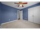 The bedroom offers carpeted floors, a ceiling fan, and a closet at 191 Bridle Dr, Angier, NC 27501