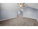 Spacious bonus room with carpet, a window and ample room for activities at 191 Bridle Dr, Angier, NC 27501