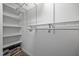 Walk-in closet with ventilated shelving is perfect for storage and organization at 191 Bridle Dr, Angier, NC 27501