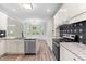 Bright kitchen with breakfast nook and stainless steel appliances at 2015 Saddlebrook Dr, Archer Lodge, NC 27527