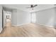 Bedroom with wood-look floors, ceiling fan, and lots of natural light at 2018 Remington Oaks Cir, Cary, NC 27519