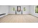 Spacious bedroom with wood floors and modern design at 2018 Remington Oaks Cir, Cary, NC 27519