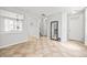 Open entryway with tile flooring leading to the living spaces and staircase at 2018 Remington Oaks Cir, Cary, NC 27519