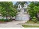 Charming two-story home featuring a two-car garage and well-maintained landscaping at 2018 Remington Oaks Cir, Cary, NC 27519