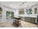 This is a bright kitchen boasting stainless steel appliances and stylish cabinetry at 2018 Remington Oaks Cir, Cary, NC 27519