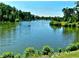 Scenic lake view surrounded by lush greenery, perfect for relaxing at 2018 Remington Oaks Cir, Cary, NC 27519