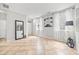 Bright living room with tile flooring, neutral paint, and abundant natural light at 2018 Remington Oaks Cir, Cary, NC 27519
