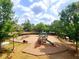 Community playground with slides and climbing structures at 2018 Remington Oaks Cir, Cary, NC 27519