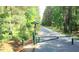 Scenic walking trail surrounded by lush greenery and trees, perfect for outdoor enthusiasts and nature lovers at 2018 Remington Oaks Cir, Cary, NC 27519