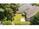 Aerial view showing the home's backyard, patio, and mature landscaping at 206 Lake Brandt Dr, Cary, NC 27519